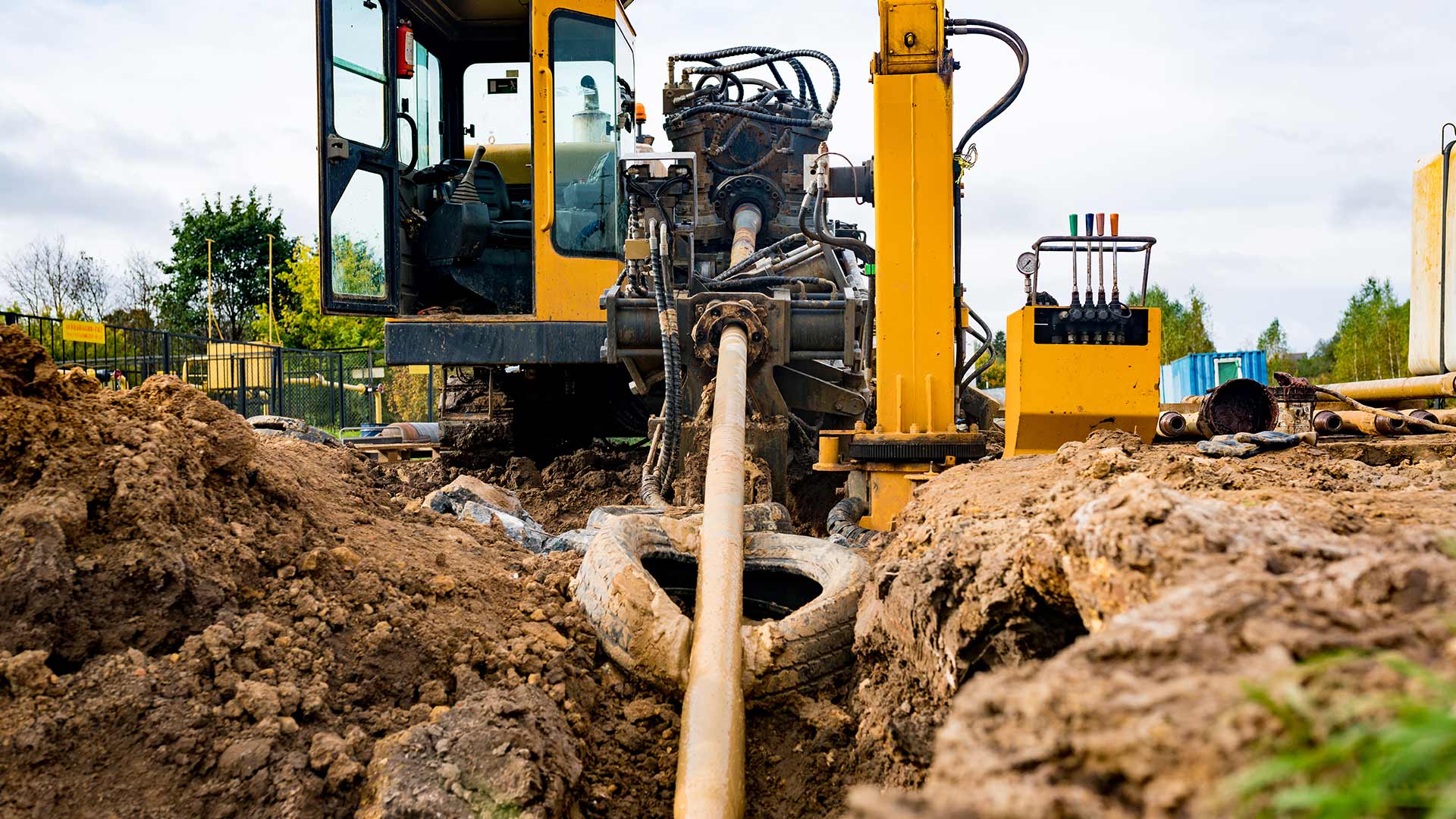 commercial-building-exteriors-with-excavator-for-pipe-line-repairs-st-charles-mo